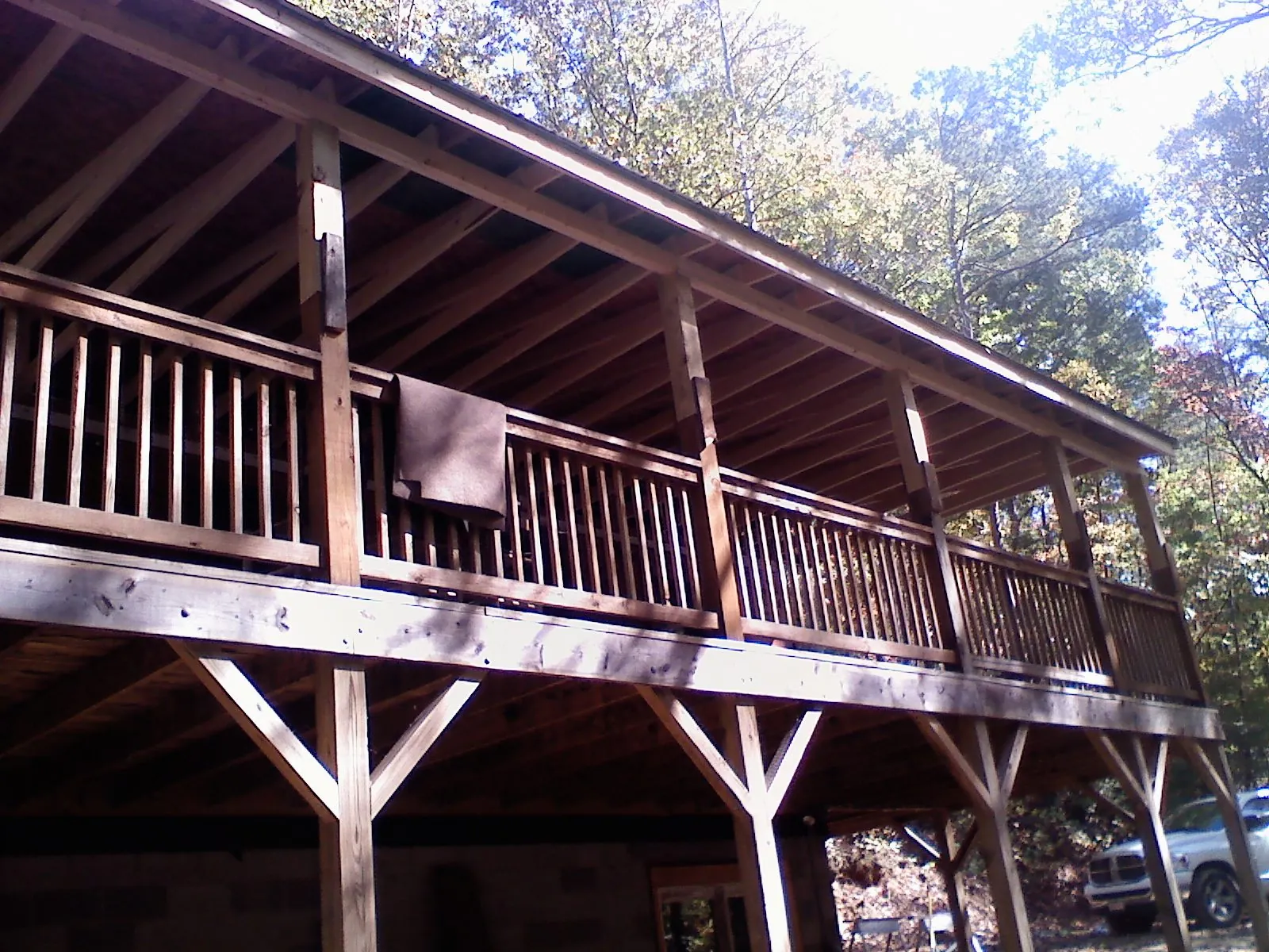 Timber framing under a new elevated porch and deck — Roof Leak Repair in Las Vegas by Roofing Brothers